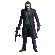 A standing action figure of the Joker from The Dark Knight, holding a gun and a knife