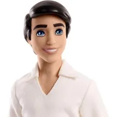 A close-up of the Prince Eric doll's face, with a wide smile and bright blue eyes.