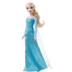 A full-body product photo of the Elsa doll, standing in her blue dress with a shimmering skirt and sheer cape.
