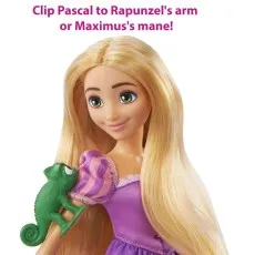 A detailed shot of the Rapunzel doll, highlighting the feature to clip the Pascal toy onto her arm.