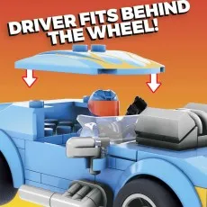 Close-up of a Mega Construx Hot Wheels car, showing how the figure fits inside.