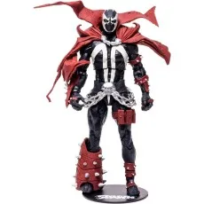 A Spawn action figure in a black and white costume with a large red cape, red spiked armor, and a silver chain belt