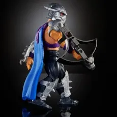 A side view of the Turtles of Grayskull Shredder action figure, holding a large crossbow.