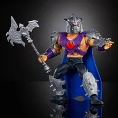 The Masters of the Universe Shredder figure with a blue cape, wearing a spiky helmet and armored boots.