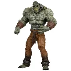 A detailed Killer Croc action figure. It has scaly green skin, a muscular build, and wears orange pants