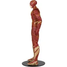A side view of The Flash action figure in a red and gold suit, standing on a black base