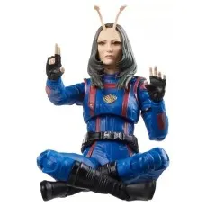 A close-up of a Mantis action figure sitting cross-legged, with her hands raised as if meditating