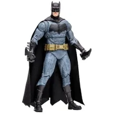 A Batman action figure from the DC Multiverse line, posed with two batarangs.