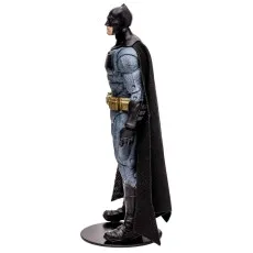 A Batman action figure from the side, on a black display base.