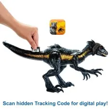 A person scanning a code on a black and gold Indoraptor toy with a phone app..
