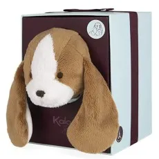 A soft toy puppy's head is shown peeking out of a gift box