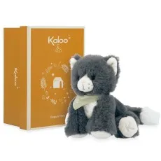 A soft gray and white plush cat with a light green scarf, sitting next to a matching gift box