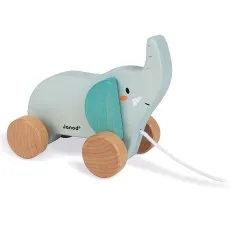 A Janod pull-along wooden toy elephant with a light blue body, blue ears, and wooden wheels.