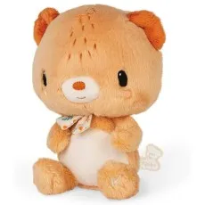 A plush light brown teddy bear with a white belly, wearing a patterned ribbon