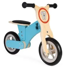 A Janod balance bike with a light blue frame, a wood front, and the number 17 inside a red circle.