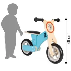 A wooden balance bike with the number 17 on the front, with its height of 49 cm indicated by an arrow.