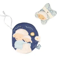 A close-up of a soft children's fabric book with a sleeping mother sheep hugging her baby.