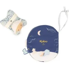 A baby's soft, circular book depicting a sweet scene of a sleeping lamb, with a star-shaped toy.