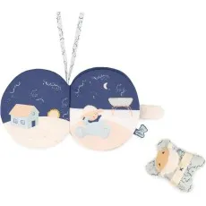 A colorful baby's fabric book showing two scenes with sheep illustrations, along with a plush star toy.