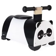 A Janod black and white wooden ride-on toy shaped like a panda, with a black seat and handlebars.