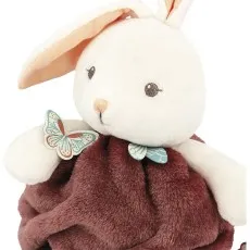 A close-up of a stuffed rabbit with a butterfly on its shoulder