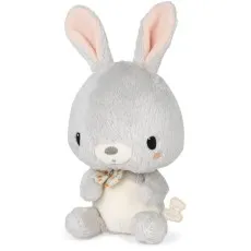 A cute plush bunny with a bow tie and an attached brand tag on its right side.