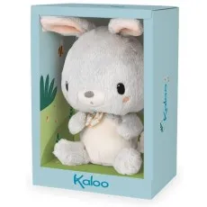 A gray plush bunny with a bow tie is shown inside a light blue Kaloo brand gift box.
