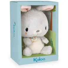 Front view of a soft, gray stuffed rabbit packaged in a box with a clear front and nature scene.