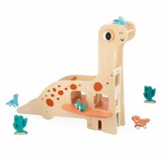 A small child plays with a wooden brontosaurus toy with a ramp and other pieces in a room.