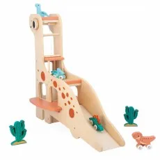 A wooden dinosaur toy with a ramp. A small blue dinosaur car is at the top of the ramp and a green one is on the bottom.
