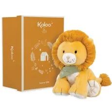 A soft, orange-yellow plush lion with a large mane and a green bandana sits next to its gift box