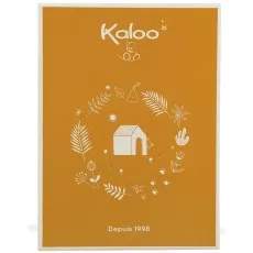 A close-up of a stuffed bear holding a light green blanket with a floral pattern