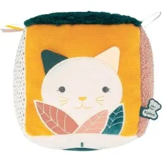 A baby toy with a white cat's face on a mustard-yellow background, and a fluffy dark green top.