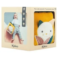 A baby toy box with a picture of a baby playing with a soft block and a view of the toy inside.