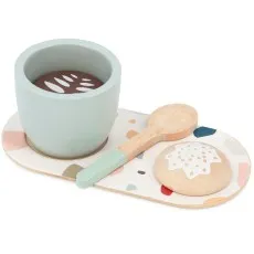 A wooden toy cup with a mint green finish, a matching spoon, and a cookie on a colorful speckled tray.