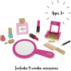 A set of wooden toy beauty accessories, including a pink hand mirror, comb, lipstick, and perfume.