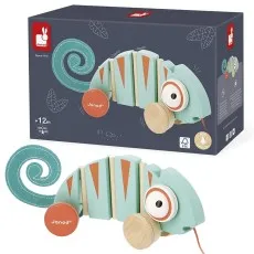 A Janod pull-along toy chameleon with a felt spiral tail and green, orange, and wood segments.