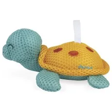 A plush toy of a turtle with a blue body and an orange shell with two dots, hanging from a white loop.
