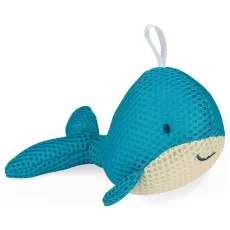 A textured, smiling whale toy in blue and tan, hanging from a white loop.