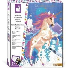 A Janod unicorn paint-by-numbers kit. The box shows a prancing unicorn with a pink mane and tail.