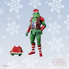 Holiday Stormtrooper action figure from the Star Wars Black Series with a red helmet, green armor, and festive accessories.