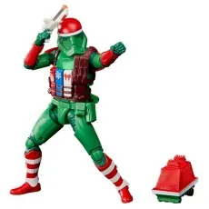 Holiday Stormtrooper action figure with a red helmet, green armor, and a small red droid in the background.
