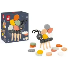 A wooden ant balancing toy and its box, with some pieces stacked and others scattered.
