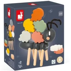 A Janod balance game featuring a black wooden ant and several colored leaf-shaped blocks.