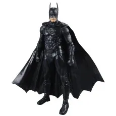 The Batman action figure is standing with its cape spread out.