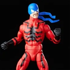A close-up of a red and black action figure of the character Tarantula
