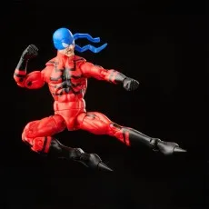 A dynamic shot of a Tarantula action figure posed as if it's leaping or kicking