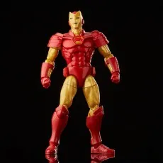 A classic red and gold Iron Man action figure standing with fists clenched