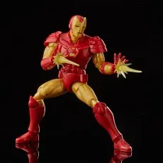 Red and gold Iron Man action figure in a combat pose, firing repulsor blasts