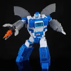 A large blue and white Transformers action figure with gray wings and a firing weapon on its arm